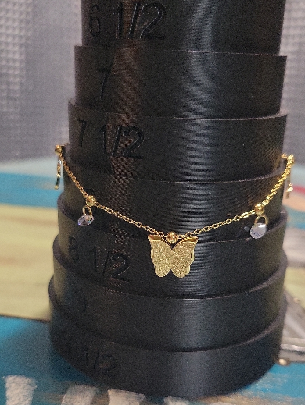 Gold Butterfly Charm Bracelet with Crystal Drops